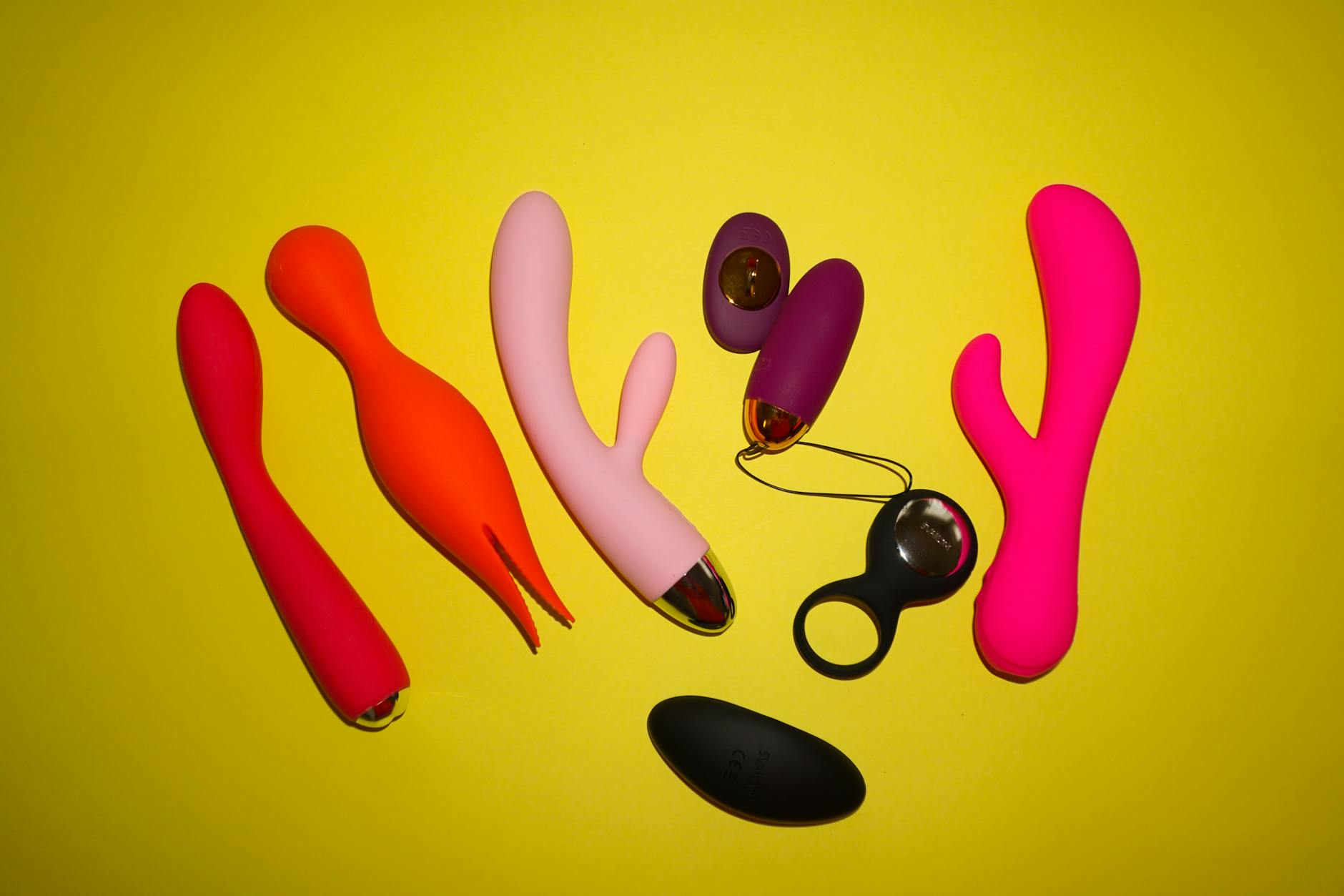 A couple holding a vibrator together, symbolizing shared intimacy and reconnection.